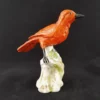 LOCRÉ - Oiseau en porcelaine corail