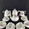VIEUX PARIS - Service à thé en porcelaine, décor floral romantique