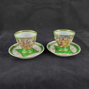 NAPOLÉON III (style) - Duo de tasses et soucoupes en porcelaine peinte